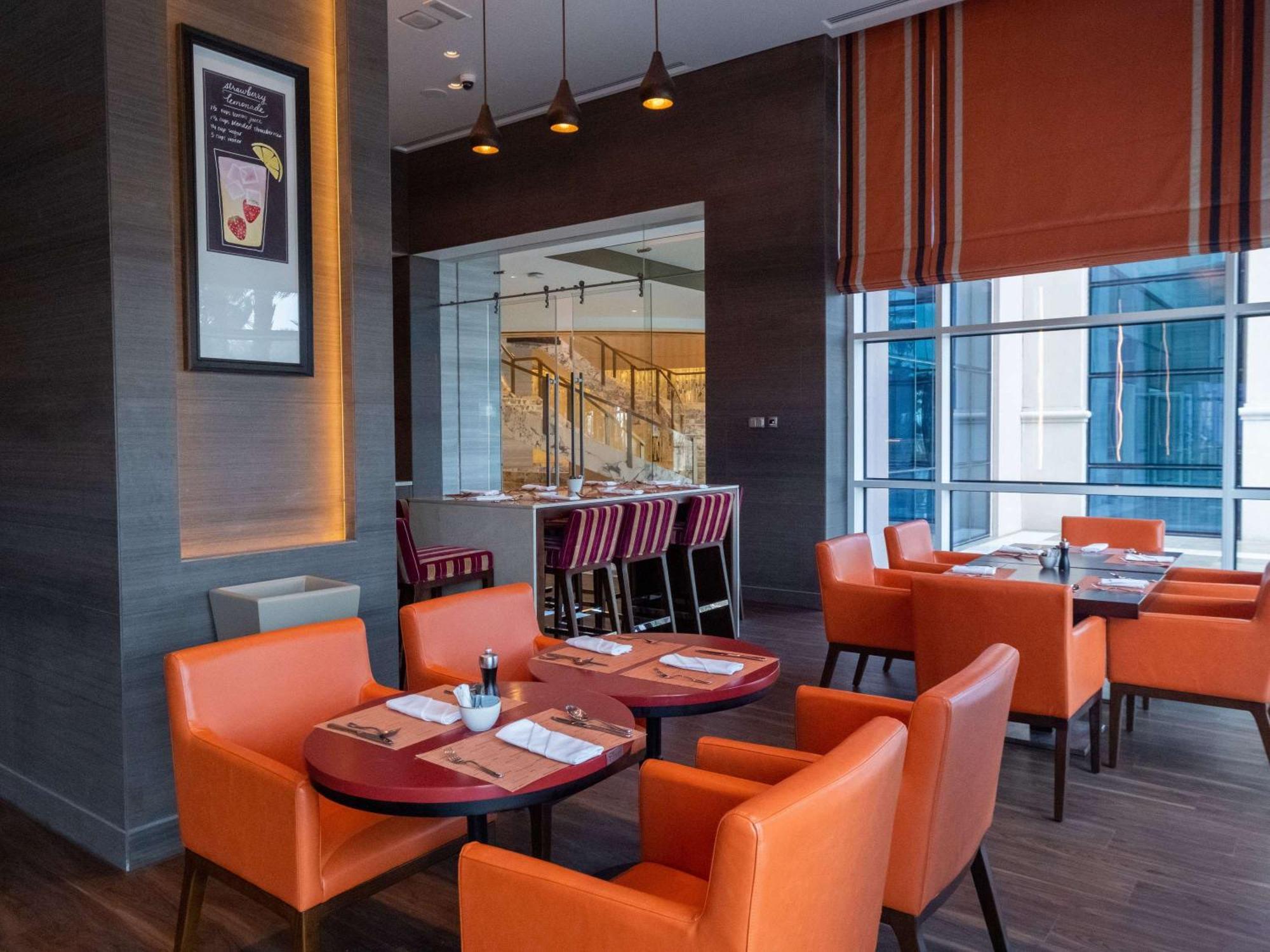 Hotel Rixos Marina Abu Dhabi Esterno foto The interior of the restaurant